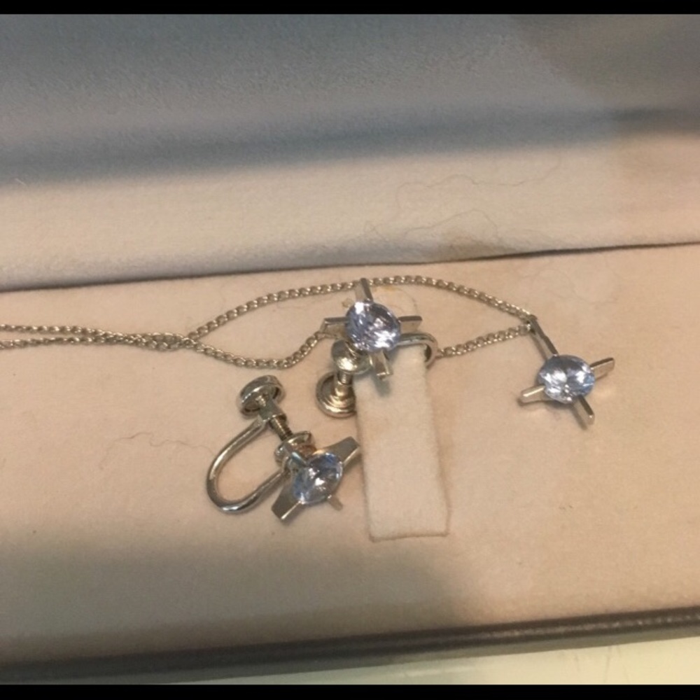 Necklace with screw earrings.